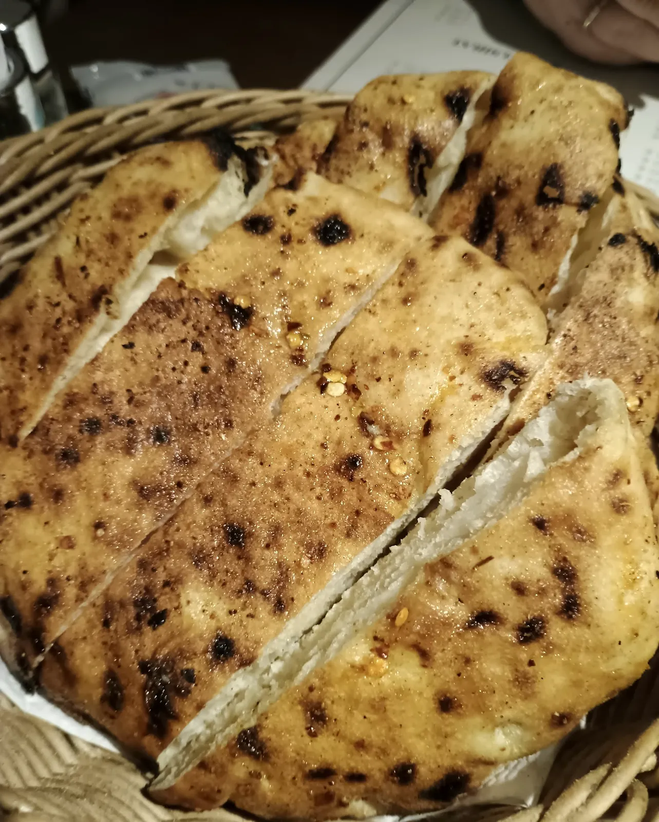 Charred flatbread in a basket
